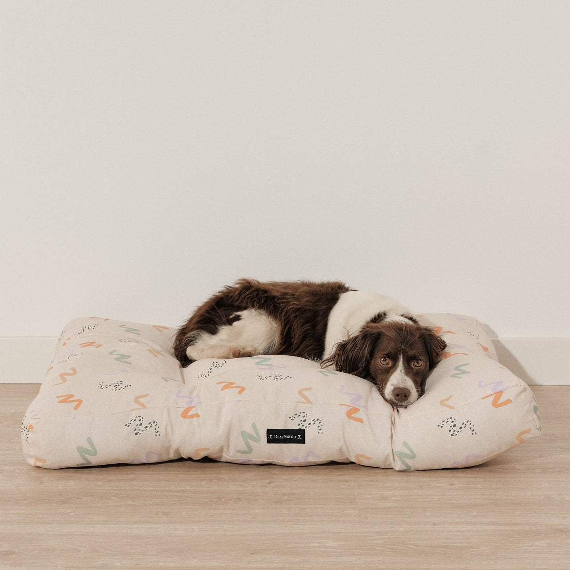 Colorful rainbow cotton dog bed with ergonomic support