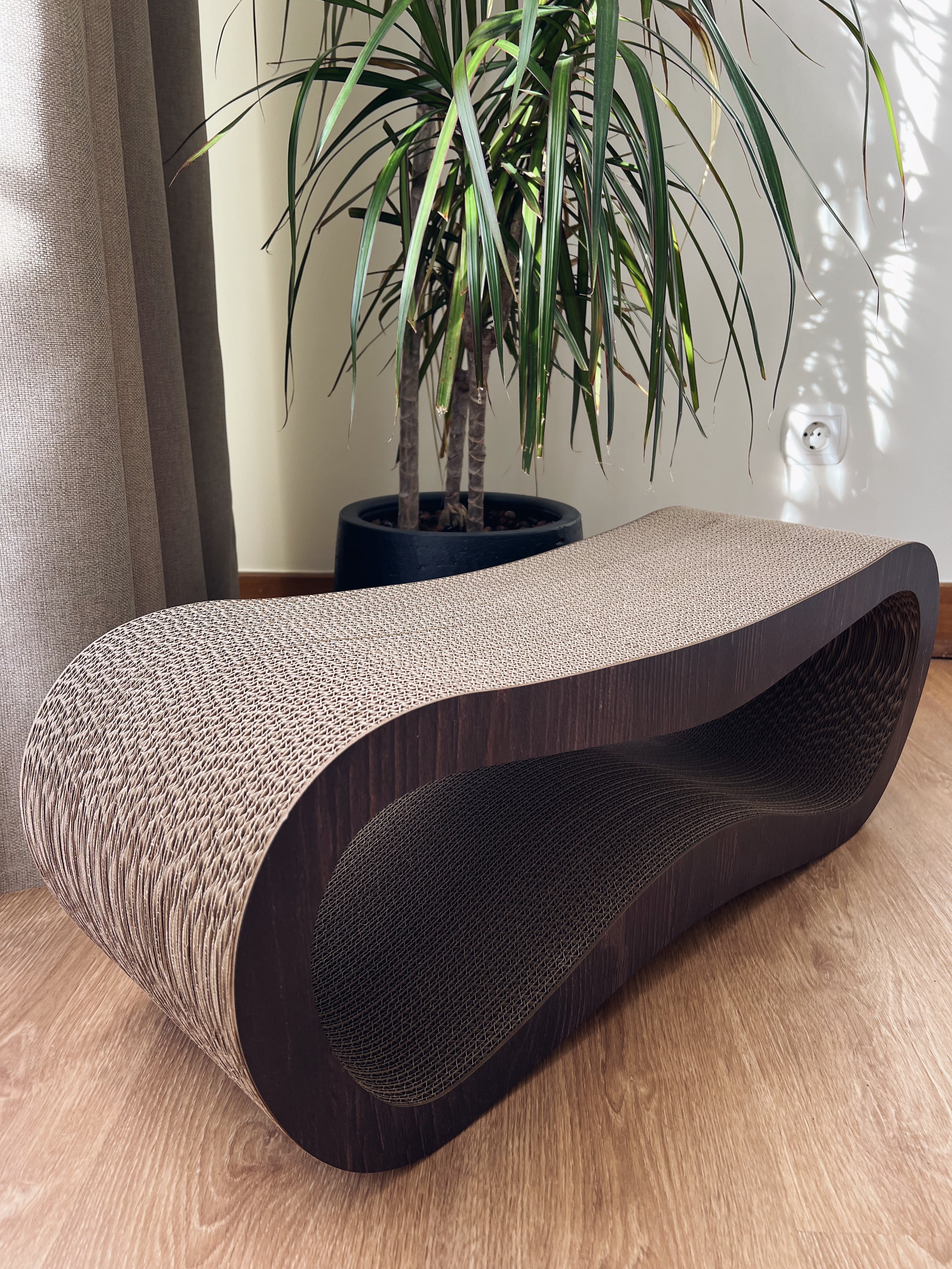 Versatile cat scratcher with tree-like texture design
