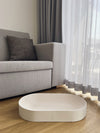 White minimalist cat scratcher and bed